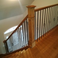 Maple Stair; Maple Colonial Handrail; Wrought Iron Pickets; Maple Box Panel Newel Post