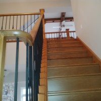 Maple Stair; Maple Colonial Handrail; Wrought Iron Pickets; Maple Box Panel Newel Post