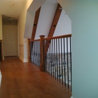 Maple Stair;Maple Colonial Handrail; Wrought Iron Pickets; Maple Box Panel Newel Post